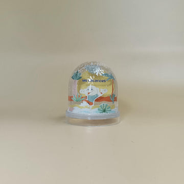 Boule à neige MS Vacances avec mascotte dans un décor tropical