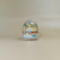 Boule à neige MS Vacances avec mascotte dans un décor tropical